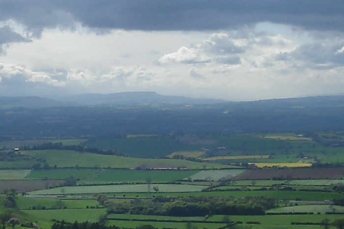 A distant view of Penhill at the entrance to Wensleydale, taken from the top of Thimbleby Bank